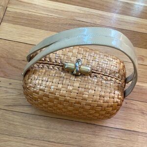 Rodo wicker woven purse. Leathery lining made in Italy.